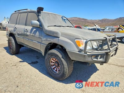 Czwarte zdjęcie samochodu z boku: 2002 LEXUS LX 470 VIN:JTJHT00W123521967 - miniatura