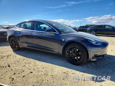 Czwarte zdjęcie samochodu z boku: 2020 TESLA MODEL 3 VIN:5YJ3E1EA8LF597037 - miniatura
