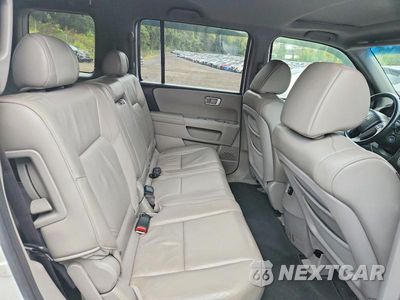 Zdjęcie 11 z 13 samochodu: 2011 HONDA PILOT EXL VIN:5FNYF3H55BB006688 - miniatura