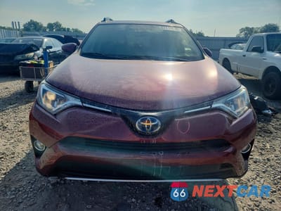 Piąte zdjęcie samochodu w środku: 2018 TOYOTA RAV4 HYBRID XLE VIN:JTMRJREV9JD174317 - miniatura