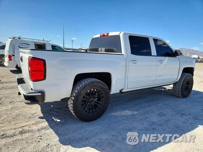 Trzecie zdjęcie samochodu z tyłu: 2018 CHEVROLET SILVERADO C1500 LT VIN:3GCPCREC1JG337058 - miniatura