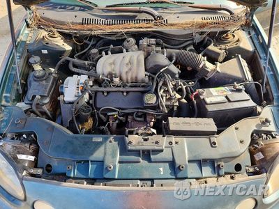 Zdjęcie 11 z 12 samochodu: 1997 FORD TAURUS GL VIN:1FALP52U1VA277494 - miniatura