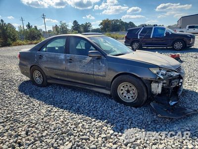Czwarte zdjęcie samochodu z boku: 2006 TOYOTA CAMRY LE VIN:JTDBE32K163064923 - miniatura