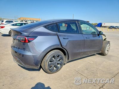 Trzecie zdjęcie samochodu z tyłu: 2023 TESLA MODEL Y VIN:7SAYGDEE4PA157701 - miniatura