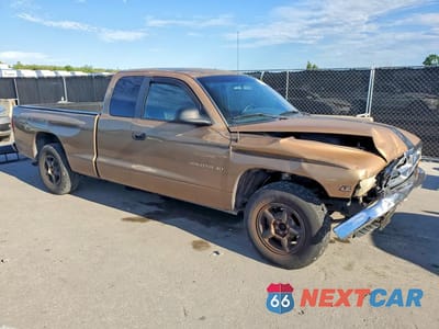 Czwarte zdjęcie samochodu z boku: 2000 DODGE DAKOTA VIN:1B7GL22X5YS674706 - miniatura
