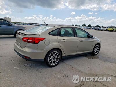 Trzecie zdjęcie samochodu z tyłu: 2015 FORD FOCUS SE VIN:1FADP3F20FL310461 - miniatura
