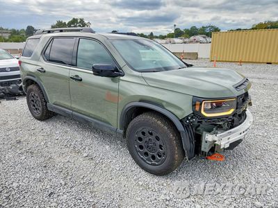 Czwarte zdjęcie samochodu z boku: 2026 HONDA PASSPORT TRAILSPORT ELITE VIN:5FNYF9H86TB028083 - miniatura