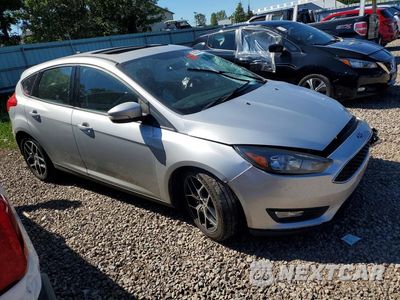 Czwarte zdjęcie samochodu z boku: 2018 FORD FOCUS SEL VIN:1FADP3M26JL317135 - miniatura