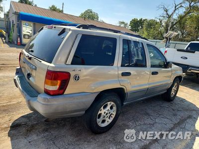 Trzecie zdjęcie samochodu z tyłu: 2001 JEEP GRAND CHEROKEE LAREDO VIN:1J4GW48S31C699192 - miniatura