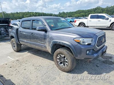 Czwarte zdjęcie samochodu z boku: 2018 TOYOTA TACOMA TRD OFF-ROAD VIN:5TFCZ5ANXJX153634 - miniatura