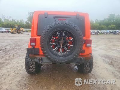 Zdjęcie 6 z 13 samochodu: 2015 JEEP WRANGLER UNLIMITED SAHARA VIN:1C4BJWEG7FL700197 - miniatura