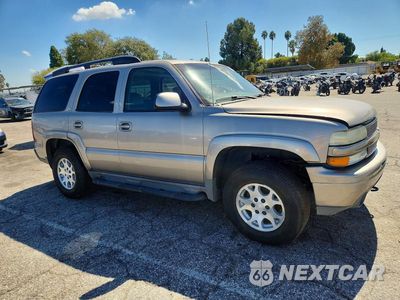 Czwarte zdjęcie samochodu z boku: 2003 CHEVROLET TAHOE K1500 VIN:1GNEK13TX3R225092 - miniatura