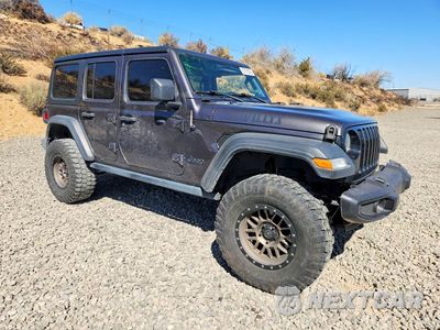Czwarte zdjęcie samochodu z boku: 2021 JEEP WRANGLER UNLIMITED SPORT VIN:1C4HJXDN2MW866901 - miniatura