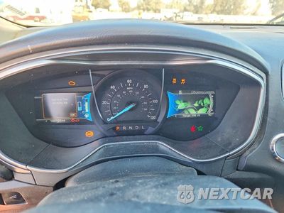 Zdjęcie 9 z 12 samochodu: 2017 FORD FUSION SE HYBRID VIN:3FA6P0LU2HR231150 - miniatura