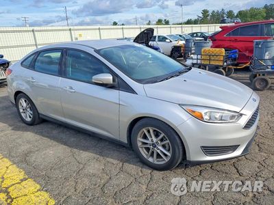 Czwarte zdjęcie samochodu z boku: 2016 FORD FOCUS SE VIN:1FADP3F21GL342594 - miniatura