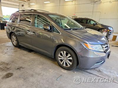 Czwarte zdjęcie samochodu z boku: 2014 HONDA ODYSSEY EXL VIN:5FNRL5H64EB101278 - miniatura