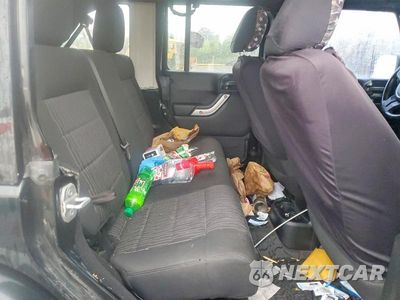 Zdjęcie 11 z 13 samochodu: 2012 JEEP WRANGLER UNLIMITED SAHARA VIN:1C4BJWEG4CL209792 - miniatura