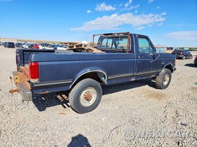 Trzecie zdjęcie samochodu z tyłu: 1989 FORD F250 VIN:1FTHF26G4KPA71312 - miniatura