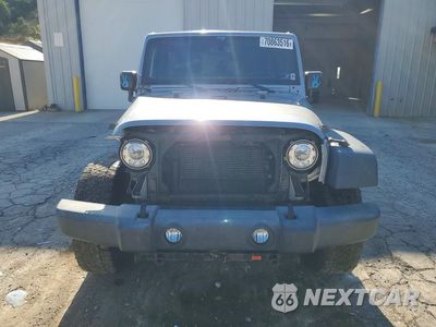 Piąte zdjęcie samochodu w środku: 2017 JEEP WRANGLER UNLIMITED SPORT VIN:1C4BJWDGXHL739273 - miniatura