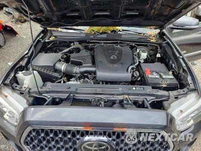 Zdjęcie 11 z 12 samochodu: 2019 TOYOTA TACOMA TRD SPORT VIN:3TMDZ5BN0KM064925 - miniatura