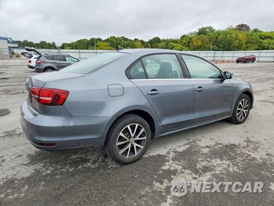 Trzecie zdjęcie samochodu z tyłu: 2017 VOLKSWAGEN JETTA SE VIN:3VWB67AJ4HM343410 - miniatura