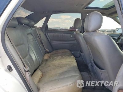 Zdjęcie 10 z 12 samochodu: 2001 TOYOTA AVALON XLS VIN:4T1BF28B21U153686 - miniatura