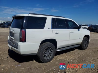 Trzecie zdjęcie samochodu z tyłu: 2020 GMC YUKON SLT VIN:1GKS2BKC4LR258273 - miniatura