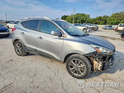 Czwarte zdjęcie samochodu z boku: 2015 HYUNDAI TUCSON SE VIN:KM8JU3AG6FU062456 - miniatura