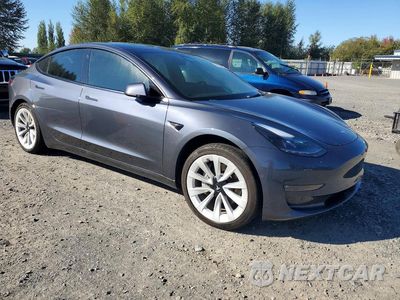 Czwarte zdjęcie samochodu z boku: 2022 TESLA MODEL 3 VIN:5YJ3E1EB0NF192981 - miniatura