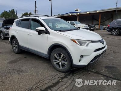 Czwarte zdjęcie samochodu z boku: 2018 TOYOTA RAV4 XLE VIN:JTMRFREV5JJ192235 - miniatura