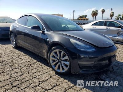Czwarte zdjęcie samochodu z boku: 2018 TESLA MODEL 3 VIN:5YJ3E1EB1JF071662 - miniatura