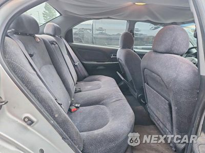 Zdjęcie 10 z 12 samochodu: 2002 HYUNDAI SONATA BASE VIN:KMHWF25S32A681777 - miniatura