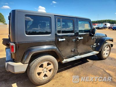 Trzecie zdjęcie samochodu z tyłu: 2009 JEEP WRANGLER UNLIMITED SAHARA VIN:1J4GA59159L772763 - miniatura
