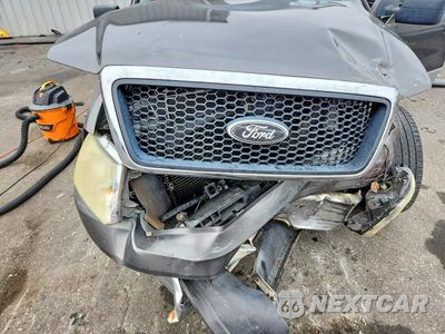 Zdjęcie 11 z 12 samochodu: 2007 FORD F150 VIN:1FTRX12VX7FA60179 - miniatura