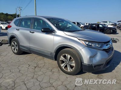Czwarte zdjęcie samochodu z boku: 2019 HONDA CR-V LX VIN:2HKRW5H3XKH413101 - miniatura