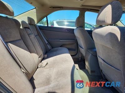 Zdjęcie 10 z 13 samochodu: 2003 TOYOTA CAMRY LE VIN:JTDBE32K230145183 - miniatura