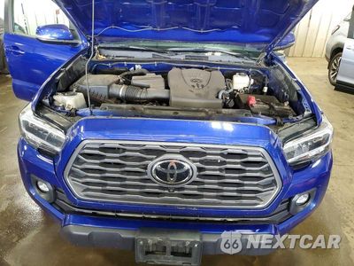 Zdjęcie 11 z 12 samochodu: 2023 TOYOTA TACOMA TRD OFF-ROAD VIN:3TMCZ5AN0PM646818 - miniatura