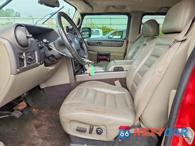 Zdjęcie 7 z 13 samochodu: 2004 HUMMER H2 VIN:5GRGN23U04H115455 - miniatura