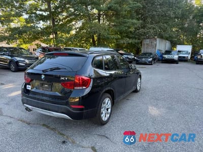 Czwarte zdjęcie samochodu z boku: 2014 BMW X1 XDRIVE28I VIN:WBAVL1C57EVY21727 - miniatura