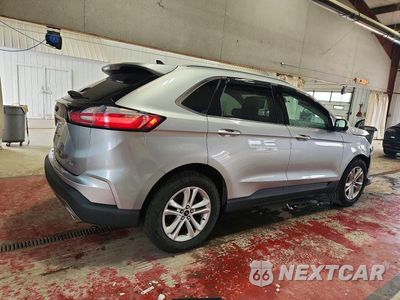 Trzecie zdjęcie samochodu z tyłu: 2020 FORD EDGE SEL VIN:2FMPK4J94LBB45943 - miniatura