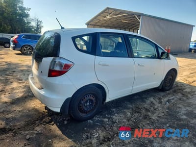 Trzecie zdjęcie samochodu z tyłu: 2009 HONDA FIT VIN:JHMGE88209S035027 - miniatura
