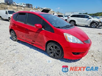 Czwarte zdjęcie samochodu z boku: 2009 HONDA FIT SPORT VIN:JHMGE88499S074166 - miniatura