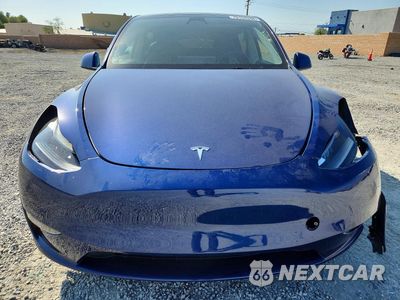 Piąte zdjęcie samochodu w środku: 2023 TESLA MODEL Y VIN:7SAYGAEE4PF615495 - miniatura