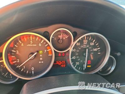 Zdjęcie 9 z 12 samochodu: 2009 MAZDA MX-5 MIATA VIN:JM1NC26F890201551 - miniatura