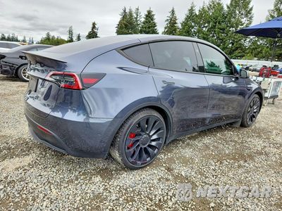 Trzecie zdjęcie samochodu z tyłu: 2023 TESLA MODEL Y VIN:7SAYGDEF0PF883194 - miniatura