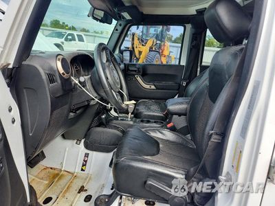 Zdjęcie 7 z 12 samochodu: 2016 JEEP WRANGLER UNLIMITED SAHARA VIN:1C4BJWEG2GL245129 - miniatura