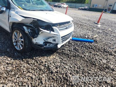 Czwarte zdjęcie samochodu z boku: 2016 FORD ESCAPE SE VIN:1FMCU9GX0GUA56267 - miniatura