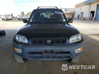 Piąte zdjęcie samochodu w środku: 1999 TOYOTA RAV4 BASE VIN:JT3HP10V9W0170970 - miniatura
