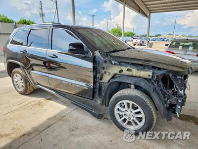 Czwarte zdjęcie samochodu z boku: 2020 JEEP GRAND CHEROKEE LAREDO VIN:1C4RJEAG7LC227637 - miniatura
