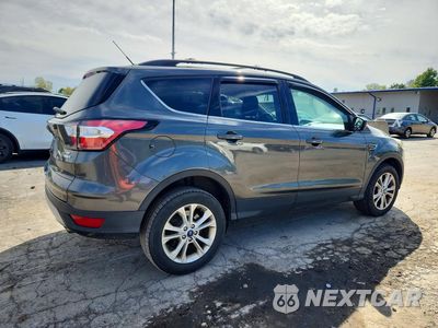 Trzecie zdjęcie samochodu z tyłu: 2018 FORD ESCAPE SE VIN:1FMCU9GD0JUD53438 - miniatura